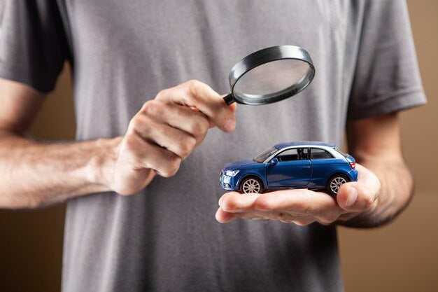 Magnifying glass on the vehicle title
